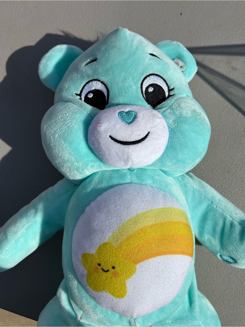 Care Bears Teal Plush with Yellow Rainbow Shooting Star Belly Badge